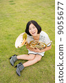 Horn player image (sitting, sitting, lawn, looking up) 9055677