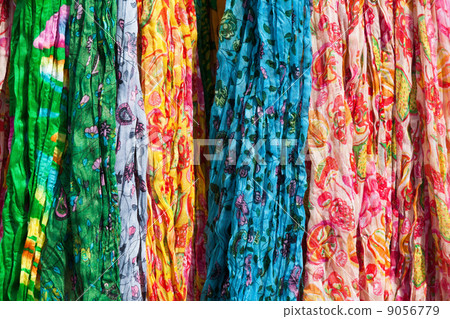 Colorful scarfs on a market stall 9056779