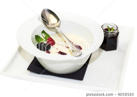 semolina porridge with berries decorated with berry jam 9058583