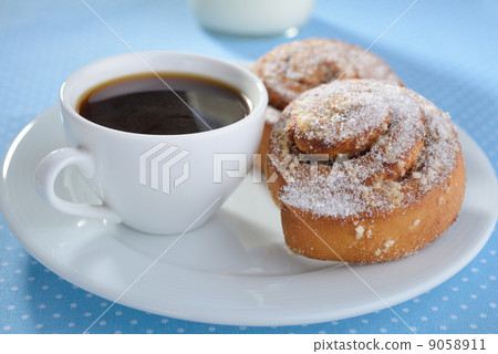 Cinnamon buns and coffee Cinnamon buns and coffee 9058911