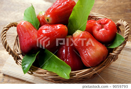 Red rose apple in basket 9059793