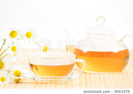 teacup with herbal chamomile tea 9061076