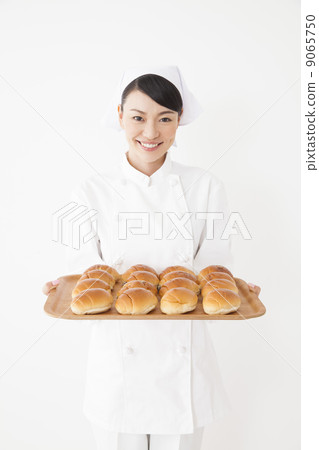 Woman in chef's coat 9065750