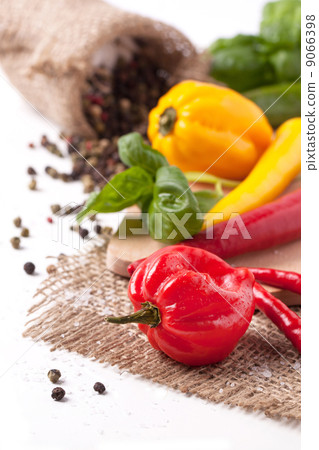 Hot chili peppers with basil 9066398