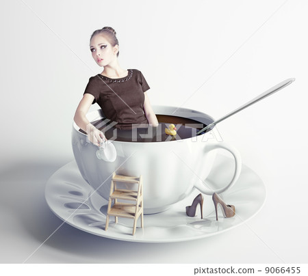 woman in cup of coffee woman in cup of coffee 9066455