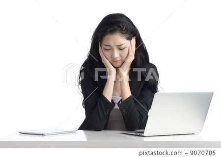 Young business woman using ipad digital tablet laptop work stress studio white background  Young business woman using ipad digital tablet laptop work stress studio white background  9070705