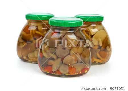 Glass jars with marinated mushrooms Glass jars with marinated mushrooms 9071051