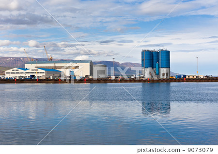 Large tanks and wirehouses at sea commercial dock in North Icela Large tanks and wirehouses at sea commercial dock in North Icela 9073079