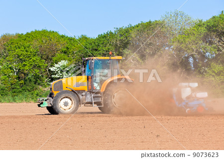 Agriculture - Tractor on the field Agriculture - Tractor on the field 9073623
