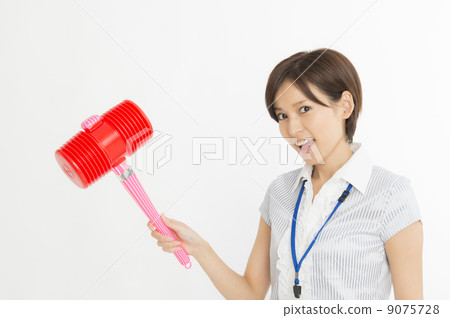 A woman with a hammer A woman with a hammer 9075728