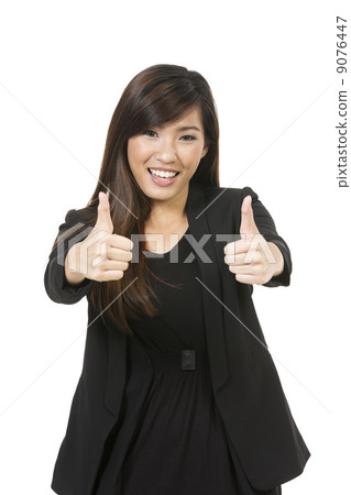 Excited Asian woman with thumb up. Excited Asian woman with thumb up. 9076447