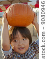 Pumpkin and a boy 9080946