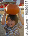 Pumpkin and a boy 9080947