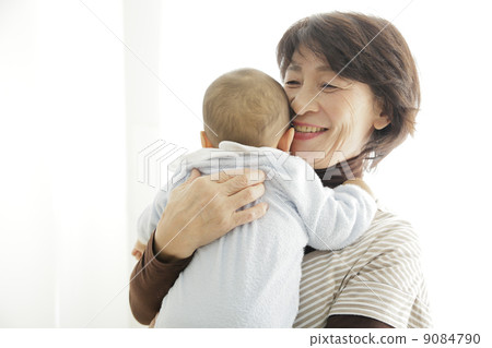 Infant and grandmother 9084790