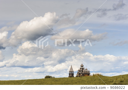 Wooden church at Kizhi against dramatic cloudscape 9086022