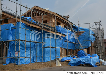 A detached house under construction 9090770