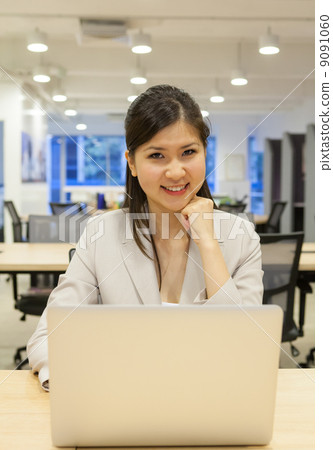 Business woman in office Business woman in office 9091060