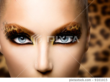 Beauty Fashion Model Girl with Holiday Leopard Makeup 9101015