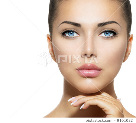 Beauty Portrait. Beautiful Spa Woman Touching her Face 9101082
