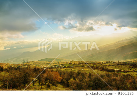 Rural landscape with sun rays Rural landscape with sun rays 9101185