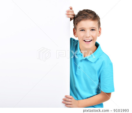 smiling boy looks out from white banner smiling boy looks out from white banner 9101993