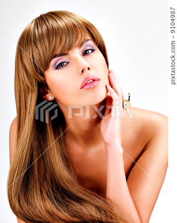 Beautiful indian woman with long straight brown hair Beautiful indian woman with long straight brown hair 9104987