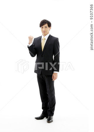  Businessman who plays guts pose 9107366