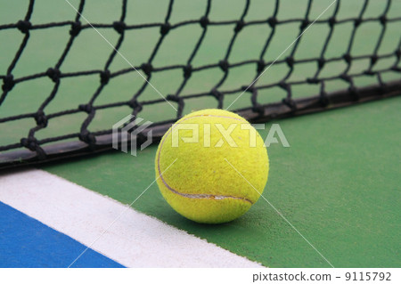 tennis on court with net 9115792