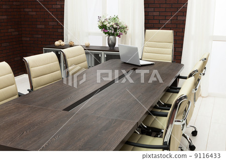 table for negotiations with the laptop 9116433