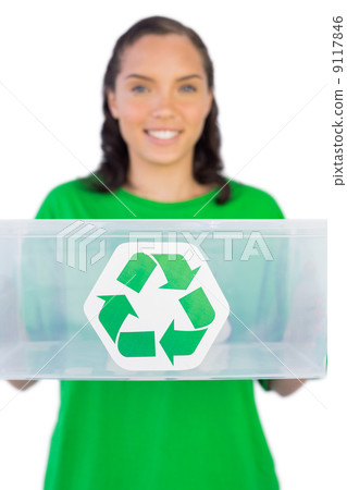 Smiling woman giving a recycling box to the camera Smiling woman giving a recycling box to the camera 9117846