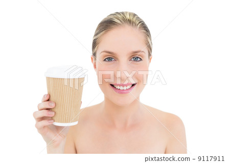 Happy fresh blonde woman holding a coffee cup Happy fresh blonde woman holding a coffee cup 9117911