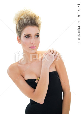 Calm cute blonde model posing for camera 9118261