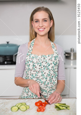 Homely gorgeous model preparing vegetables 9125450