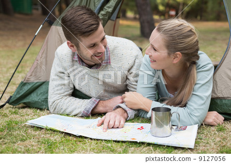 Young couple camping in the wilderness 9127056