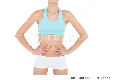 Mid section of slender woman wearing sportswear 9128655