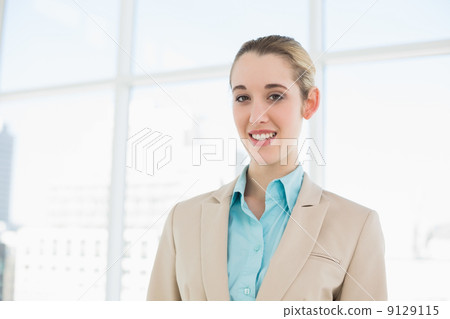 Portrait of attractive classy businesswoman posing in her office 9129115