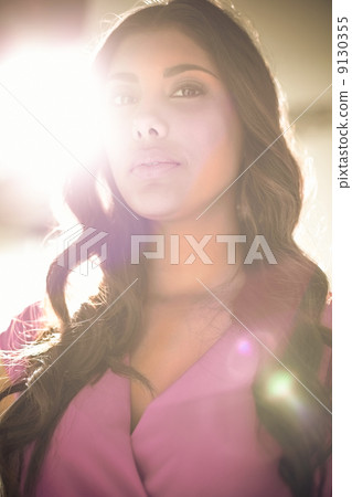 Sexy attractive brunette looking at camera Sexy attractive brunette looking at camera 9130355