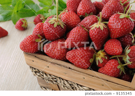 Basket full of strawberries on the table Basket full of strawberries on the table 9135345