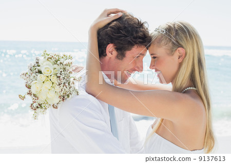 Romantic couple hugging on their wedding day 9137613