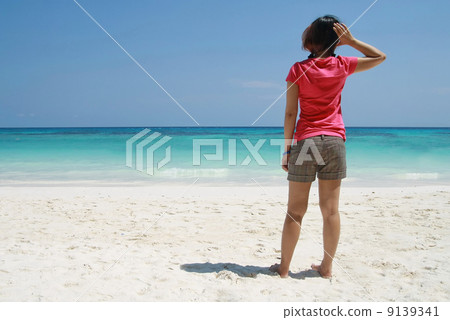asia women stand on beach asia women stand on beach 9139341