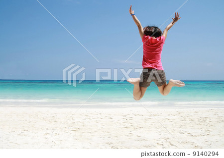 asia women jump on beach asia women jump on beach 9140294