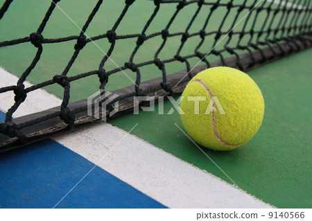 tennis on court with net 9140566
