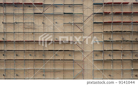 many scaffolding on very large underconstruction site many scaffolding on very large underconstruction site 9141044