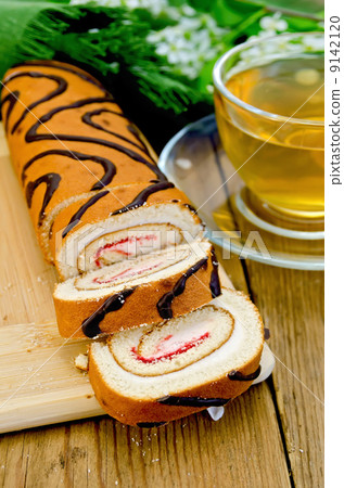 Roulade with a cup of tea on board 9142120