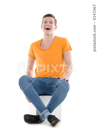 Young man laughing out loud, on white background 9143367