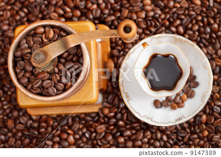 cup of coffee and roasted beans 9147389