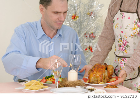 Woman preparing a diner table 9152720