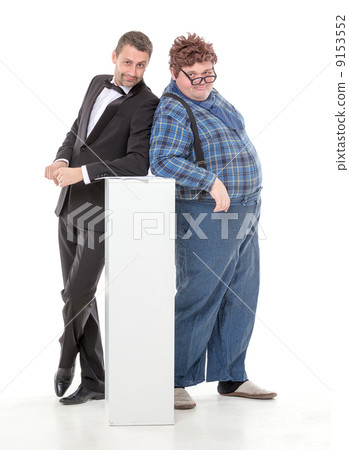 Elegant man with a country yokel 9153552