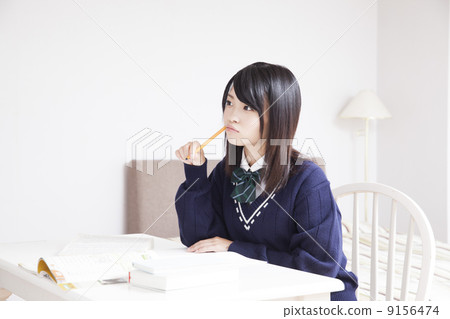 High school girl studying at home High school girl studying at home 9156474