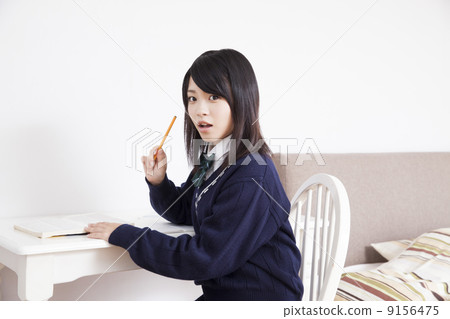 High school girl studying at home High school girl studying at home 9156475